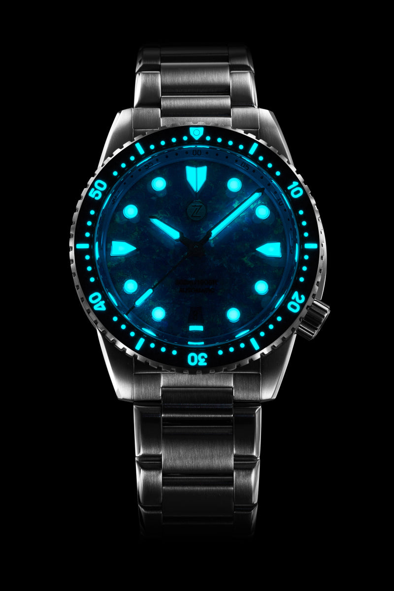 The Opal edition’s hands, markers and bezel shown illuminated.